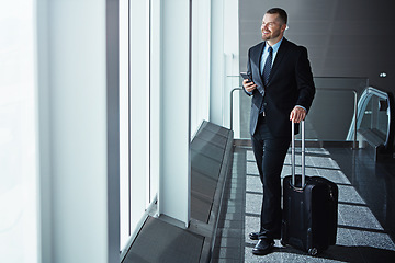 Image showing Ideas, thinking or businessman in airport with phone, luggage or suitcase for travel booking. Vision, entrepreneur or corporate worker texting on social media mobile app on international flight