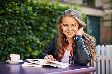 Image showing Woman, smile and reading book at outdoor coffee shop, cafe or restaurant with espresso, latte or cup. Happy, girl and relax with green tea, drink or learning info in summer, morning or city bistro