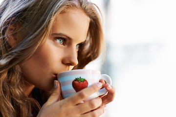 Image showing Woman, thinking and drink at coffee shop with espresso, latte or relax in city, cafe and restaurant. Calm, mindset and person with green tea, cup and brunch in morning with freedom and peace