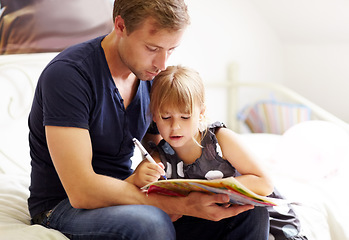 Image showing Family, father and daughter with homework for helping, bonding and learning for education in bedroom of home. People, man and girl child with homeschooling, writing in book and care on bed of house