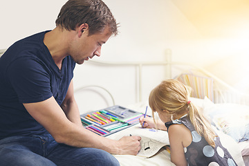 Image showing Father, daughter and coloring book for homework with helping, bonding and learning for education in bedroom of home. People, man and girl child with homeschooling, creativity and care on bed of house