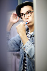 Image showing Man, brushing teeth and ready in morning routine, dental hygiene and oral health at home. Male person, face and cleaning or grooming, treatment and wellness for fresh breath, care and toothbrush