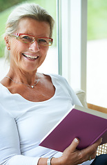 Image showing Mature, woman and portrait for book reading or relax morning, information or knowledge learn. Senior person, face and glasses for retirement education in home for study hobby, research or happy peace