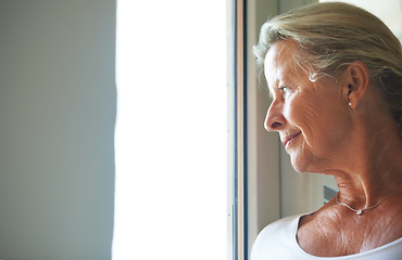 Image showing Old woman, thinking and window for nostalgia for memory in retirement, thoughts in home. Female person, senior and wondering idea at view loneliness for pensioner, peace alone or remembering life