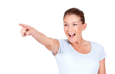 Image showing Studio, excited and woman point at advertising news, sales promotion or wow discount information, direction or commercial. Smile, advertisement and person gesture at announcement on white background