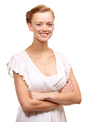 Image showing Summer, fashion and portrait of model with arms crossed, confidence or style in white background or studio. Happy, face and teenager with a smile for dressing in trendy, outfit or simple gown