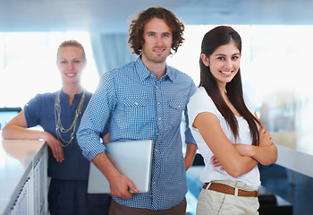 Image showing Portrait, collaboration and a business team in the office on a mission for growth or company development together. Smile, laptop and arms crossed with a designer group in an agency workplace