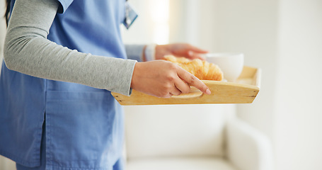 Image showing Woman, hands and nurse with breakfast tray in elderly care, support or volunteer at home. Closeup of female person, medical doctor or caregiver holding snack, meal or service for healthy nutrition