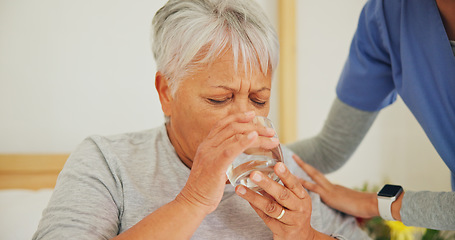 Image showing Nurse, senior woman and drinking water for medication in healthcare, support or trust at old age home. Closeup of mature patient with mineral drink, beverage or medical caregiver in natural nutrition