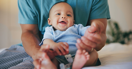 Image showing Happy baby, father and bed with cute smile in relax for morning, playing or wakeup at home together. Closeup of parent, dad or little boy and face of adorable new born enjoying bonding in bedroom