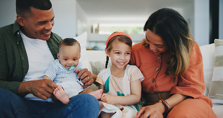 Image showing Family, happiness and conversation on couch, smile and joy or love, bonding and humor or comedy, sofa and fun. Happy parents and children, laughing and support at home, silly and goofy or positive