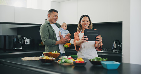 Image showing Family, tablet and selfie in kitchen, smile and internet on technology, cooking and memory. Happy parents and baby, profile picture and mobile app or cooking, digital and online or bonding in home