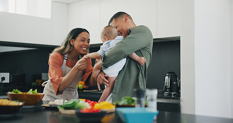 Image showing Family, smile and play or cooking, love and bonding or fun, relax and support or laughing at home. Happy parents and baby, connect and humor or funny, joy and relaxed or silly, goofy and kitchen