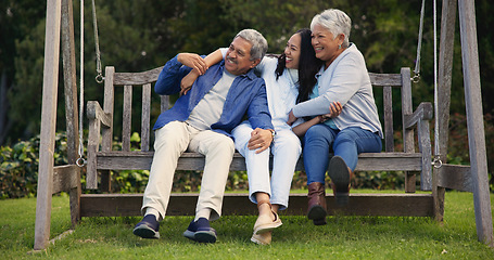 Image showing Senior parents, hug or woman on bench with laughing, nature or bonding with goofy on retirement. Mature man, mother or older daughter for together in comic joke, lounge or embrace for love in garden