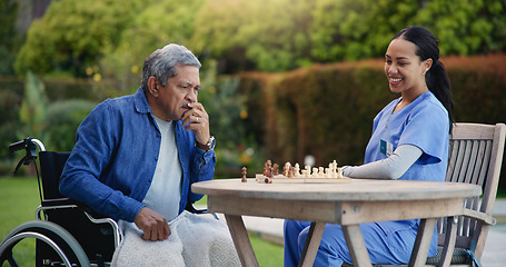 Image showing Happy woman, nurse and senior playing chess in nature for elderly care, match or thinking in strategic game. Female, medical caregiver or person with a disability contemplating next move on board