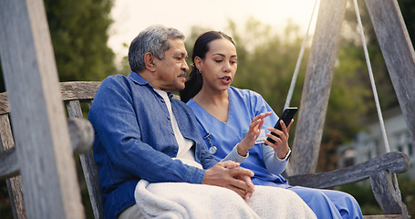 Image showing Outdoor, bench and nurse with old man, smartphone and connection with social media, discussion and internet. Pensioner, outdoor and caregiver with elderly person, cellphone and typing with email