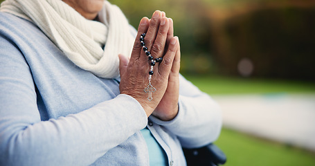 Image showing Senior, woman or hands praying with rosary for religion, worship and support for jesus christ in garden of home. Elderly, person and prayer beads for thank you, gratitude and trust in God for praise