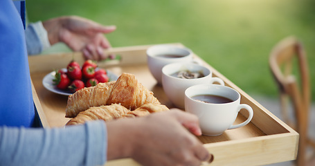 Image showing Food, breakfast and tray for morning, tea and fruit, pastry and crossiants, strawberry and nutrition. Healthy living, fiber and beverage for thirst, coffee and nurse to serve, meal and backyard