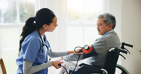 Image showing Man, caregiver and senior in wheelchair for blood pressure, monitoring or elderly care at old age home. doctor or medical nurse checking BPM of mature patient or person with a disability at house