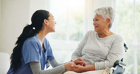 Image showing Happy woman, nurse and holding hands with senior in wheelchair, support or trust for healthcare advice at home. Medical doctor, caregiver or person with a disability smile for care or help at house