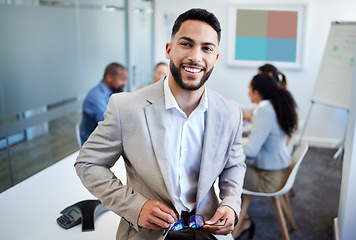 Image showing Business man, portrait and meeting in office with smile, suit and cleaning glasses with pride, leadership and finance. Accountant, happy boss or financial advisor in workplace with team for strategy