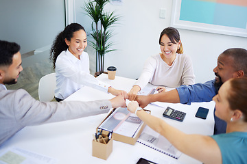 Image showing Business people, team and hands for fist bump, office or happy for teamwork, diversity and financial goals. Men, women or circle for solidarity sign, support or top view of group at accounting agency