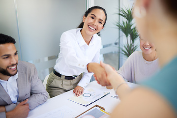 Image showing Business people, handshake and finance meeting in office for promotion, onboarding or welcome to company. Women, shaking hands or happy for congratulations, hiring or thank you with teamwork in group