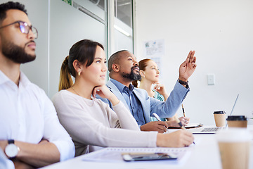 Image showing Seminar black man, business people and hand raised to ask questions about project, ideas or planning community plan. Group row, crowd and employee engagement, discussion or negotiation at conference