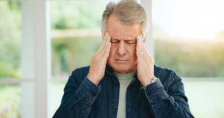 Image showing Frustrated senior man, headache and stress in burnout, anxiety or depression at home. Closeup of tired mature male person with migraine, pain or sore head in mental health, mistake or fail at house