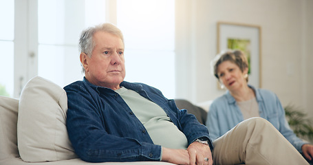 Image showing Senior, couple or stress with conflict and fight on sofa in living room of home with anger and silence. Elderly, man or woman with argument, upset and frustrated on couch in lounge of house or ignore