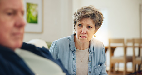 Image showing Senior, couple and stress with conflict and divorce on sofa in living room of home with anger and silence. Elderly, man or woman with fight, upset and frustrated on couch in lounge of house or ignore