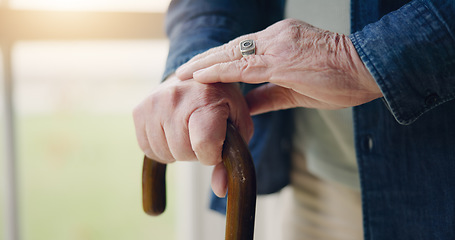 Image showing Hands, walking stick or elderly person with disability, retirement closeup or cancer in home. Senior care, cane or help with balance, support or Parkinson disease with arthritis with health issue