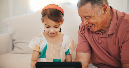 Image showing Home, grandfather and girl with tablet, smile and relax with social media, online gaming and digital app. Apartment, elderly man and pensioner with grandchild, tech and happiness with fun or network