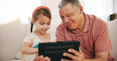 Image showing Home, grandfather and girl with tablet, internet and relax with social media, technology and digital app. Apartment, old man and pensioner with grandchild, happiness and online games with fun