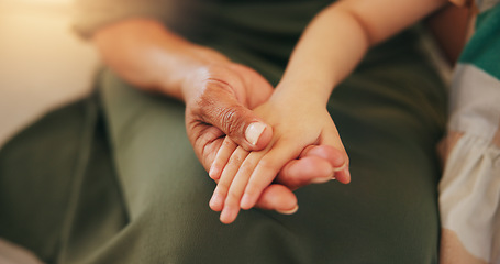Image showing Child, old woman and holding hands closeup for safety care or together bonding, protection or relax. Young kid, grandparent and fingers or family connection in retirement, embrace for development
