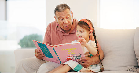 Image showing Grandpa, child and reading book on sofa for literature, education or bonding together at home. Grandparent with little girl or kid smile for story, learning or relax on living room couch at house