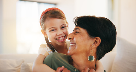 Image showing Child, grandmother and hug on sofa for laugh bonding, relax connection in retirement. Girl, old woman and embrace on couch for holiday rest or together in lounge for funny joke, love support or care