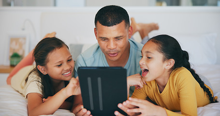 Image showing Happy, tablet and children networking with father in living room and relaxing together at home. Digital technology, bonding and girl kids watching video with young dad in the lounge of modern house.