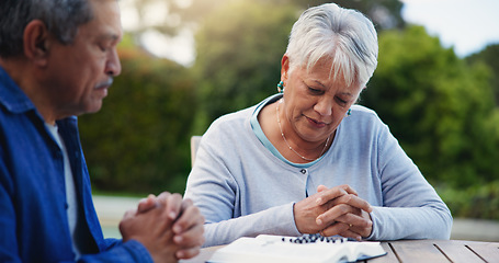 Image showing Old couple and pray at bible for religion faith or god hope or holy spirit praise, study for worship. Senior, people and hands for support reading or help research for belief, christian or education