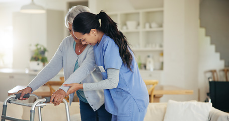 Image showing Senior woman, person with disability and walking frame for support, nurse and handholding. Healthcare, elderly for medical care, patient rehabilitation and physiotherapy for injury and recovery