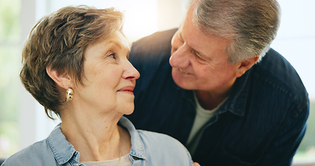 Image showing Love, senior or happy couple talking in home living room bonding or speaking in marriage commitment. Romance, eye contact or mature woman in a conversation with a man to relax on holiday vacation