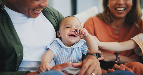 Image showing Family, smile and play on couch, baby and bonding or love, relax and support or laughing at home. Happy parents and children, connect and humor or funny, joy and relaxed or silly, goofy and closeup