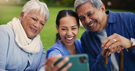 Image showing Happy woman, doctor and senior couple in selfie for photography, elderly care or retirement in nature. Medical nurse or caregiver smile with mature people for picture, photograph or memory at park