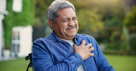 Image showing Elderly man, heart attack and emergency in wheelchair in garden, retirement and cardiac arrest in nature. Senior person, chest pain and anxiety for healthcare crisis, fear and medical risk by lawn