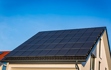 Image showing Photovoltaic panels on the roof of family house, solar panels. 