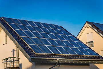 Image showing Photovoltaic panels on the roof of family house, solar panels. 