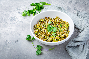 Image showing Roasted organic cauliflower and broccoli rice with herbs - paleo and ketogenic diet concept