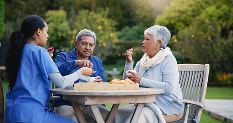 Image showing Nurse, eating or breakfast for elderly care, retirement or healthcare support at park or nature. Caregiver, senior man or old woman with tea, meal or outdoor snack together in health and wellness