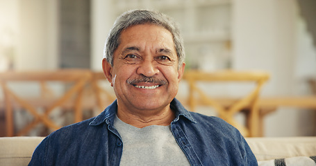 Image showing Portrait, senior man and smile in home to relax for retirement, confidence and good mood. Happy face, elderly guy and pensioner on sofa in living room with wisdom, old age and optimism in Colombia