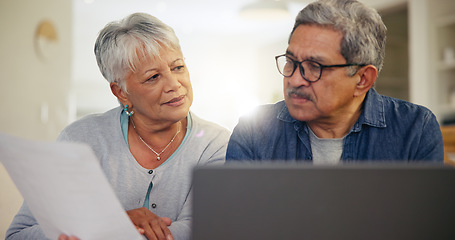 Image showing Senior couple, laptop and documents in home for budget, planning financial assets or investment portfolio. Man, woman and paperwork at computer of banking loan, retirement savings or insurance policy